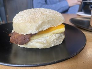 Breakfast sandwich with bacon and cheese   at Jet Black Coffee Company - Gateway in Portland
