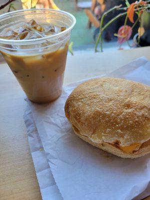 Latte and breakfast sandwich at Jet Black Coffee Company - Gateway in Portland