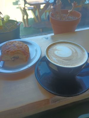 Pan au chocolate and a latte, sorta crappy picture but that's happycows charm! at Jet Black Coffee Company - Gateway in Portland