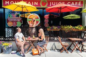 Enjoy our Summer Patio with some of the best view in town!  at Mountain Juice Cafe in Canmore