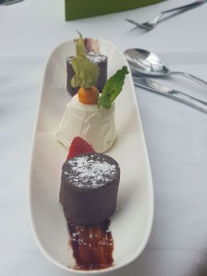 Chocolate-brownie vegan with vanilla-parfait at Thermenrestaurant in Baden