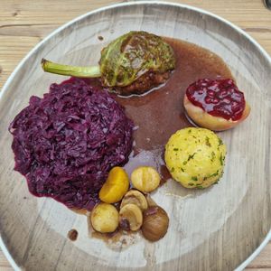 Vegan "goose" with pear& cranberry, potato dumpling, chestnuts and red cabbage at Thermenrestaurant in Baden