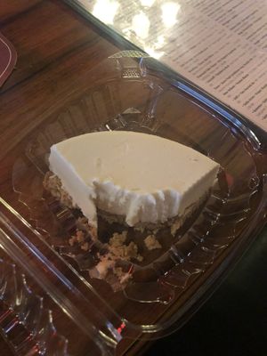Half eaten key lime vegan cheesecake at Union Jack Pub in Indianapolis