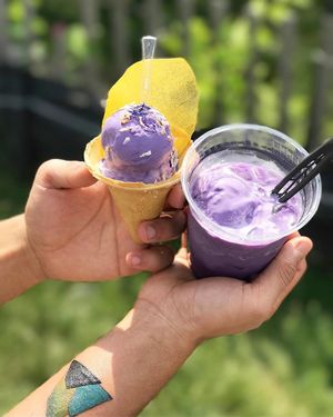 Vegan ube ice cream in a salted pretzel cone with a dehydrated mango chip or vegan ube ice cream in an ube milk float with tapioca pearls. Ask for these because they're not on the menu.  at Ube Kitchen - Food Stall in Brooklyn
