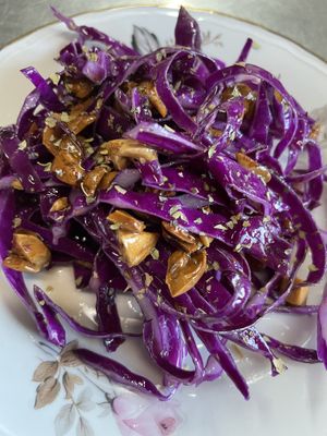 Insalata di cavolo rosso , mandorle tostate succo di mandarino e olio Evo  at Agriturismo Piccapane in Cutrofiano