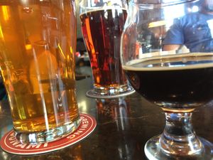 L->R: Beak Bender hoppy IPA, Sea ‘n Red ale, Mother of all Storms barley wine  at Pelican Brewing in Cannon Beach