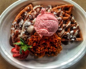 Red Velvet Waffles, Crispy CHICK'N, and Rose Ice Cream  at Sprouting Dreams in Dayton