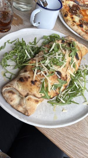 Folded sausage walnut pizza   at The Flat in Exeter