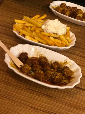 Seitan currywurst with fries and vegan garlic mayo at Curry One in Berlin