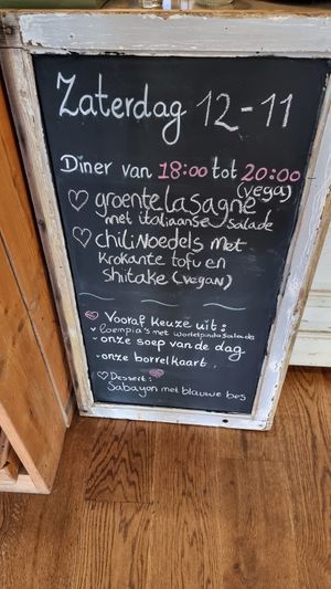 Street sign, menu at Logica Cafe Restaurant in Leiden