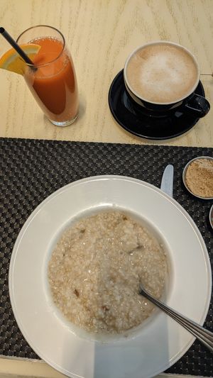 Steel cut oats, fresh squeezed juice, and a latte with oat milk at Wynn Hotel - Jardin in Las Vegas