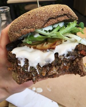 Tropical Burguer feito com Pão Australiano e Hamburguer de Lentilha, Cogumelos Paris e Nutricional Yeast. Ketchup e maionese caseiros da urban, abacaxi assado, picles, mozarela de castanhas alface e microgreens!!!!!  at Urban Farmcy in Porto Alegre