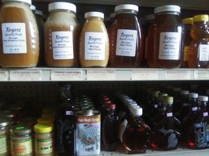We sell local honey and local maple syrup. at Rogers Natural Foods in Edmore