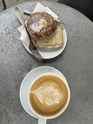 Lemon 🍋 loaf, Breakfast cookie and Latte with oatmilk   at Milano Coffee Roasters - Denman St in Vancouver