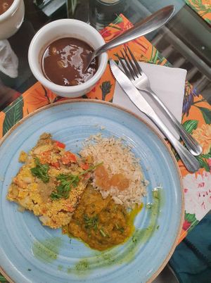 Rice, smash pumpkin and lentil cake. Black bean. at Raw Porto Alegre in Porto Alegre