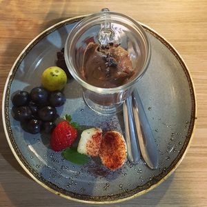 Fondue de Castanhas, Tamara, cacau, açúcar de Yacon acompanhado das frutas da estação  at Raw Porto Alegre in Porto Alegre