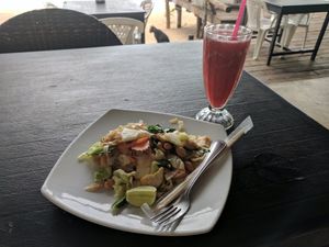 Cashew, tofu and pineapple fried noodles with a strawberry shake at In Touch in Koh Tao