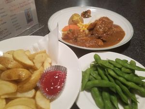 Japanese curry, fried potatoes without butter on the side, Hokkaido edamame- everything was great at Syoujikimura in Furano