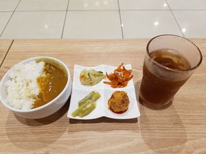 While waiting for the Ramen, you will get side dishes if you ordered a set meal. This is mini curry rice and bitter sugarless barley tea at Samurai Ramen - Tebrau City in Johor Bahru