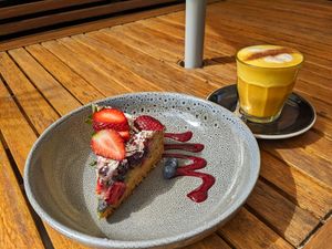 Golden milk and sweet treat 😋 at The Garden Plate in Lismore