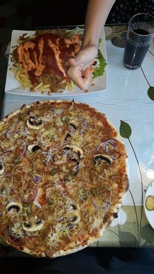 Vöner with fries and vöner pizza (normal size) at Ali Baba in Turku