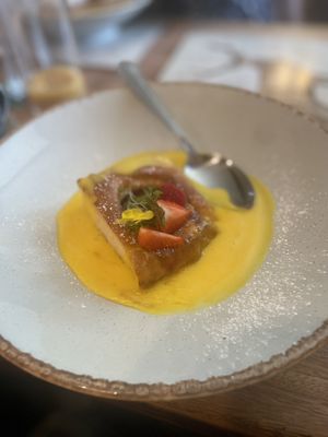 Upside down plum pudding with saffron crème anglaise  at The Chester Arms in Chicheley
