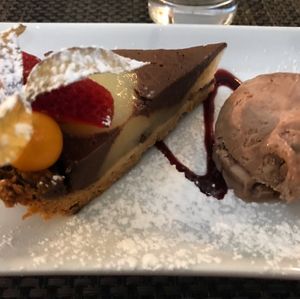 Dark choc and pear tart with choc ice cream! 😋 at The Chester Arms in Chicheley