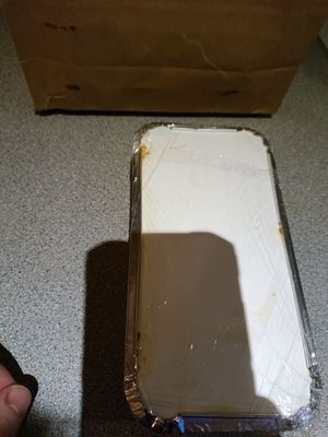 The container was wrapped in film to keep mess in at Govinda's - North City in Dublin