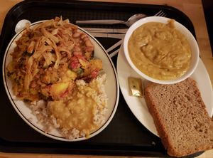 Medium dinner plate (a sampler of the different dishes they had that day, including curry on rice, curried vegetables, baked beans and more) and soup. Everything pictured here is vegan, other than the butter.  at Govinda's - North City in Dublin