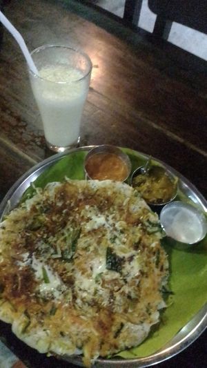 For dinner, I would never have ordered the uttapam (here made w/out onions by my request), w/out the waiter's wise recommendation.  It does have cheese, apparently. at Mangos Indian Veg Restaurant in Jaffna
