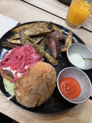 Black bean burger with sweet potato wedges, mayo and ketchup  at Moagem in Aljezur