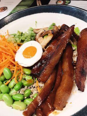 Seitan bowl, brown rice Eda Mami, and a vegan egg which was made from coconut and Suraci sauce.  at Wagamama in Dartford
