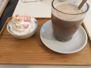 Hot coco with whipped cream at V-Box in Ghent