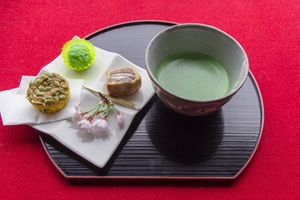 Example of the Ladies set. Zunda mochi (sweetened edamame over pounded mochi rice), Matsushima (red bean with cream cheese "waves"), and squash cake with green matcha tea. at Kanrantei Tea House in Matsushima