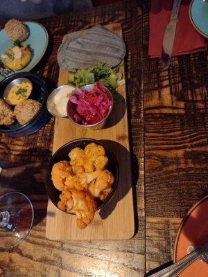 Arancini (top right); Buffalo cauliflower (centre) at The Tipsy Vegan in Cambridge