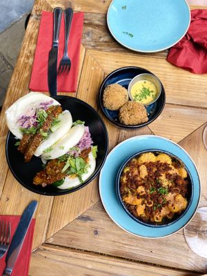 Korean bao buns, arancini, macaroni with chorizo  at The Tipsy Vegan in Cambridge