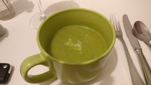 Pea soup, amazingly fresh and exactly matched to the bowl's color at Hortela in Portimao