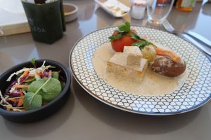 Delicious tofu and vegetables with wine sauce. One of the choice from the vegan daily menu. at Hortela in Portimao