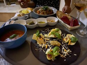 Fig salad, gazpacho, olives, bread and chickpea curry  at Hortela in Portimao