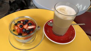 Chia pudding, and latte with oat milk  at Elska Coffee in Vilnius