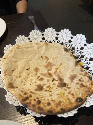 Naan with cocunut, nuts. Very sweet taste!   at Delhi in Malmo
