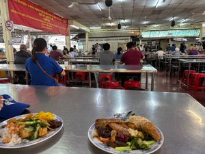 Our two plates filled with food at Dharma Realm Guan Yin Sagely Monastery in Kuala Lumpur
