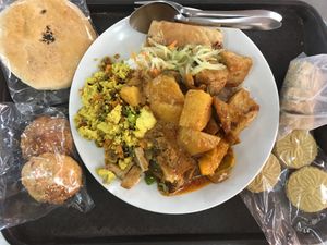 buffet food and pastries at Dharma Realm Guan Yin Sagely Monastery in Kuala Lumpur