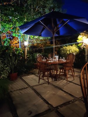 Outside seating area at The Guava Limb in San Ignacio