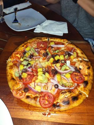 Hawaiian vegan pizza, they modified it at The Guava Limb in San Ignacio