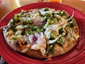 Classic crust, tomato base, vegan cheese, green pepper, broccoli, red onion, and oregano. at Extreme Pizza in Arlington