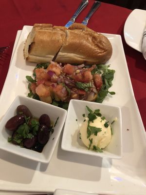 The entry bread with salsa  at Leona & 3 Brothers in Lynbrook