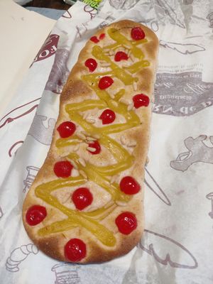 Coca de Sant Joan with pastry cream at Santa Clara Bakery  in Barcelona