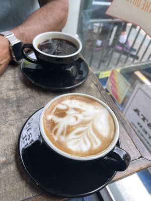 Latte with oat milk from next door Frisson  at Fresh From Hell in New York City