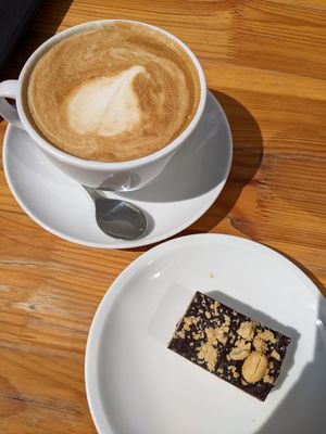 Soya milk coffee and peanut bite at My Deli Love  in Berlin